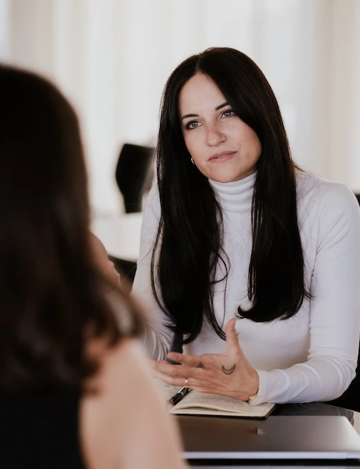 Leila Hodzic therapist sits across from a patient